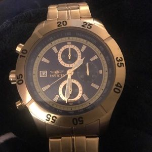 Men’s Invicta gold/cobalt blue watch